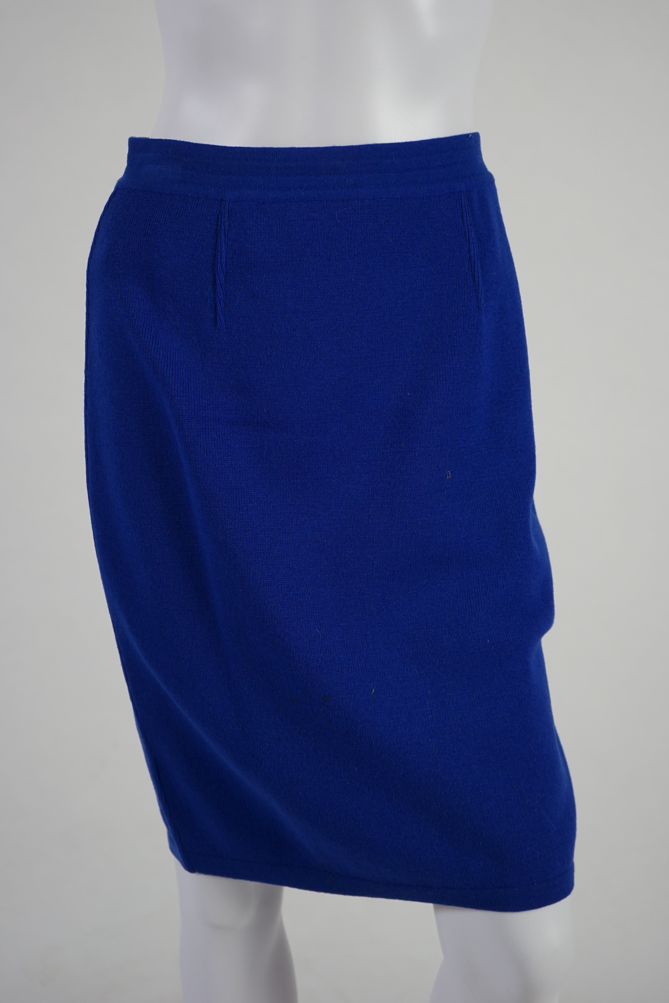 A Vera da Pozzo knitted royal blue suit with fur detail, knitted dress with fur cuffs and additional knitted skirt. Approx size 10-12 Proceeds to Happy Paws Puppy Rescue